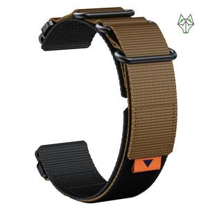 Tan and black nylon Apple Watch band with orange accent, featuring durable loops and secure clasp