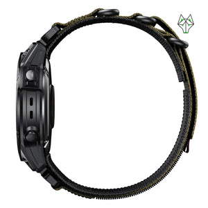 Black Apple Watch with olive green paracord band, rugged design, side buttons visible